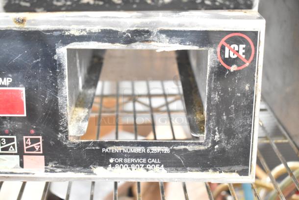 Star Pro Max stainless steel double panini press in used condition. Features visible controls and no ice warning label. Patent and service number displayed.