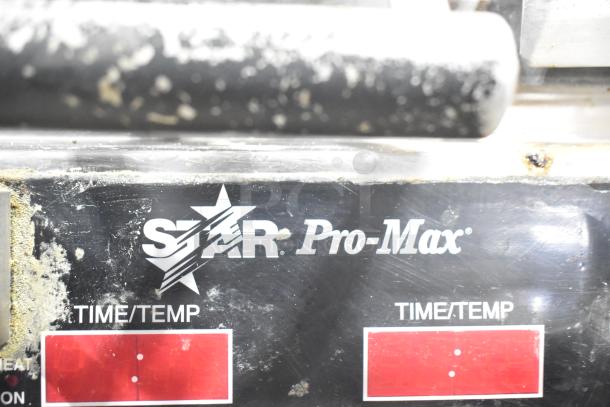 Star Pro Max Stainless Steel Double Panini Press, used condition, timer and temperature controls visible.