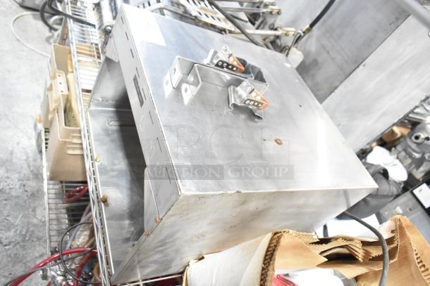 Metal commercial countertop warmer, 115 volts, 1 phase, stainless steel, with two top handles, minor surface wear.