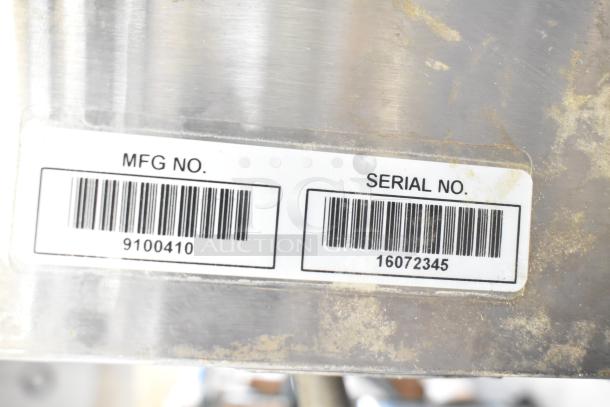Roundup stainless steel commercial food steamer with barcode labels, model for Taco Bell, 208V, 1 phase, showing MFG No. 9100410 and Serial No. 16072345.