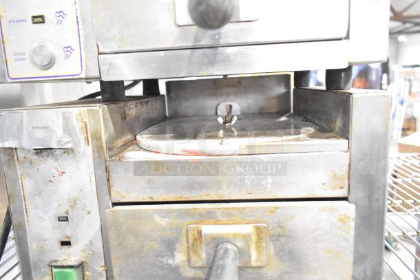 Roundup TBS-1X stainless steel commercial food steamer, used, 208V, 1 phase, visible wear on control panel and surface.