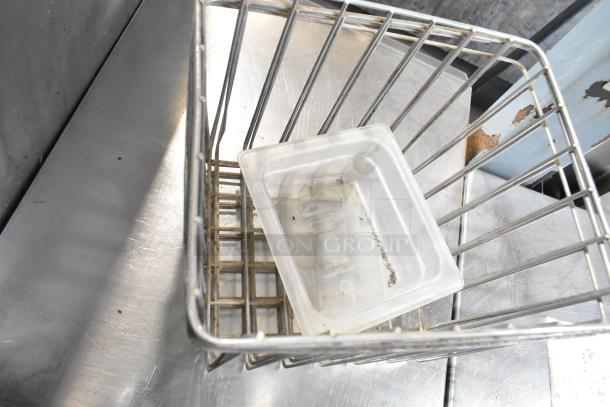 Metal wire basket with a clear plastic tray; part of an auction lot including a cup dispenser and fry basket. Used condition.