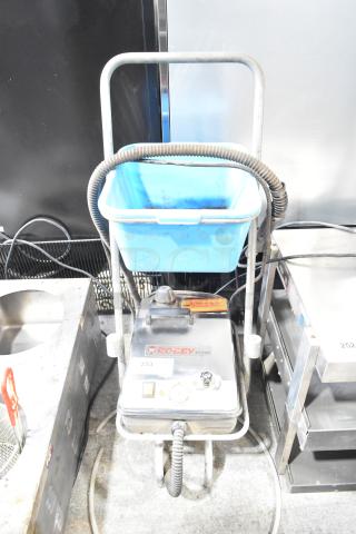 Robby VS3000 Metal Dry Steam Cleaner, 115 Volts, 1 Phase, in used condition. Unit features control knobs and a blue bin.