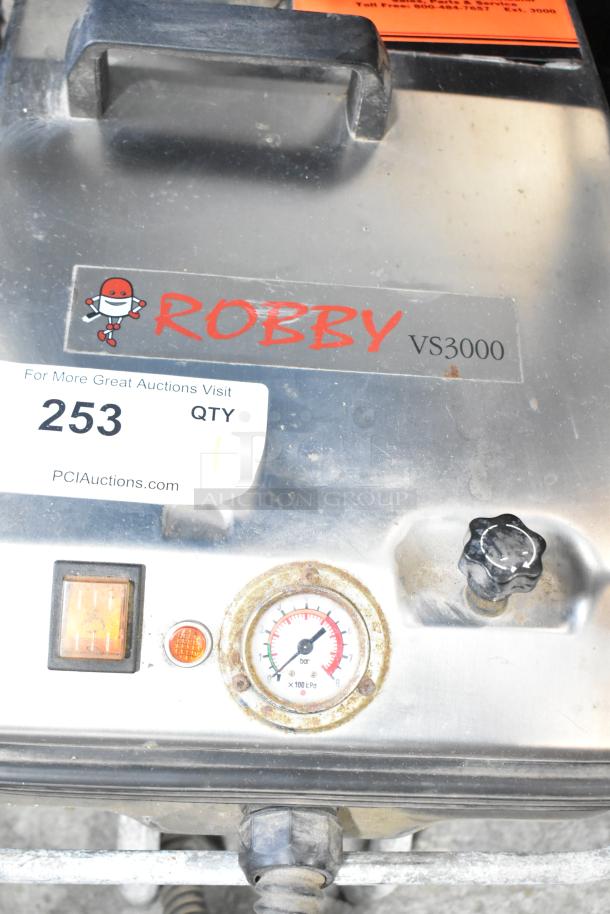 Robby VS3000 Commercial Dry Steam Cleaner in metal casing with pressure gauge, knob, and switches. 115 Volts, 1 Phase.