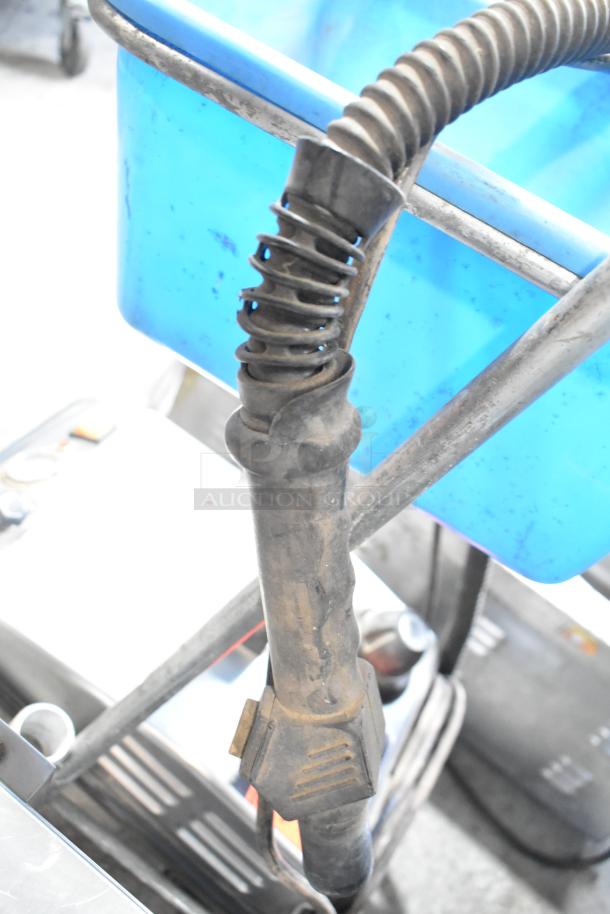 Robby VS3000 commercial dry steam cleaner hose. Features durable metal build, 115 volts, 1 phase power. Light wear visible.