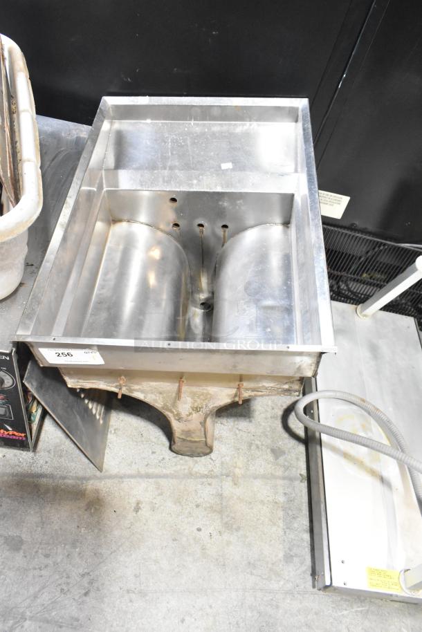 Stainless steel unit with dual trough, used condition, rust on base, tagged "256".