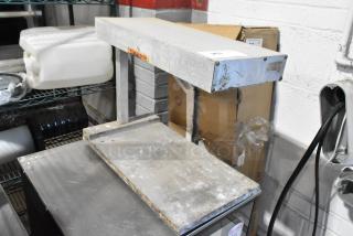 Metal countertop heat strip warmer, 115 volts, 1 phase, used condition with visible wear, ideal for food service.