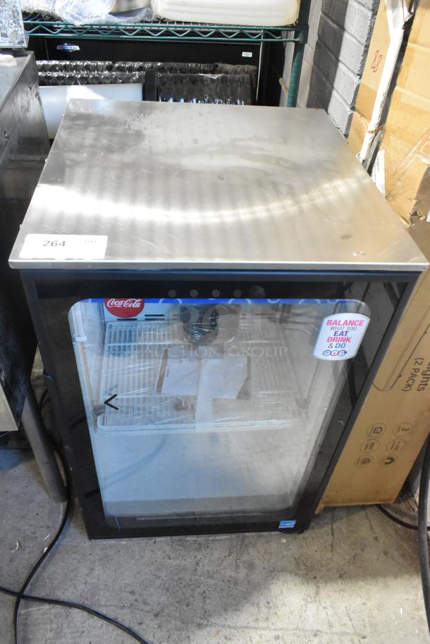Imbera EVC04 metal mini cooler merchandiser, 115 volts, 1 phase. Features Coca-Cola branding on glass. Good condition.