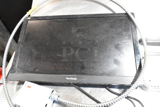 ViewSonic monitor with some wear, part of 10-item auction including metal cash drawer and keyboard.