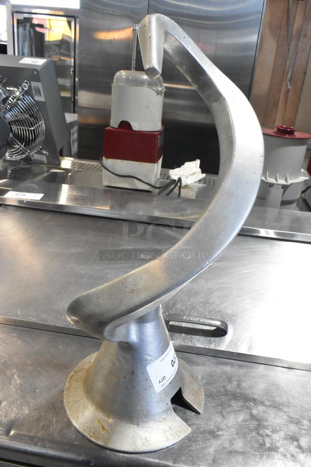 Hobart VML80ED metal dough hook attachment for 80-quart mixer; commercial-grade; visible wear; label indicating model.