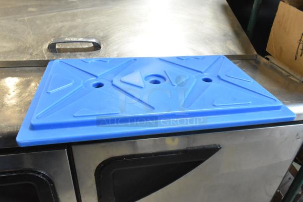 Blue CaterGator ice board for food pan carriers, new with scratch and dent. Dimensions: 20 3/4" x 12 3/4" x 1 1/2".