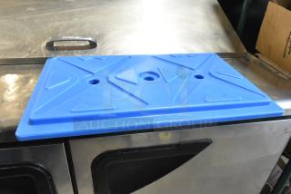Blue CaterGator ice board for food pan carriers, new with scratch and dent. Dimensions: 20 3/4" x 12 3/4" x 1 1/2".