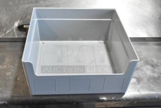 Brand new 104976V2GY condiment bin large, gray plastic, minor scratches, durable material, ideal for kitchen organization.