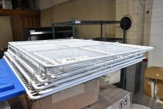 Lot of 6 poly-coated racks stacked, in good condition. Visible tag reads "278." Ideal for storage use.