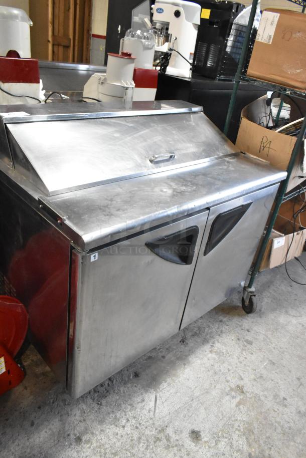 Turbo Air TST-48SD commercial sandwich prep table, stainless steel, on casters, 115V, good condition, Model TST-48SD.