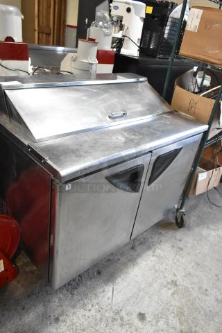 Turbo Air TST-48SD commercial sandwich prep table, stainless steel, on casters, 115V, good condition, Model TST-48SD.