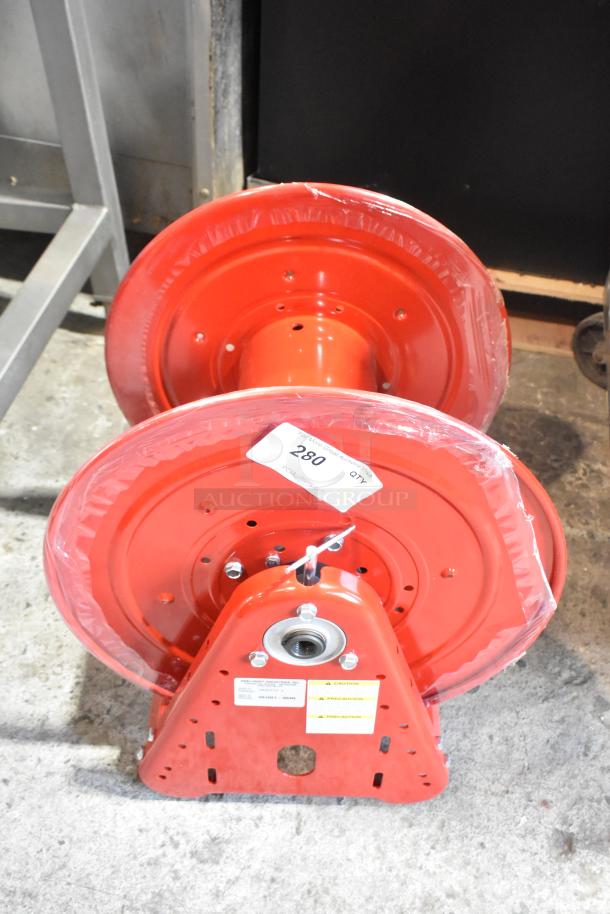 Reelcraft CA32112 L red metal hose reel, new condition, features durable construction and mounting details.