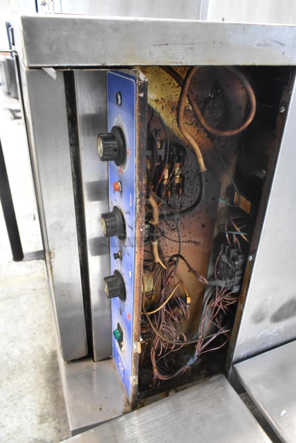 Bakers Pride 456GDCOER21 convection oven control panel, showing internal wiring and knobs. Condition appears worn.