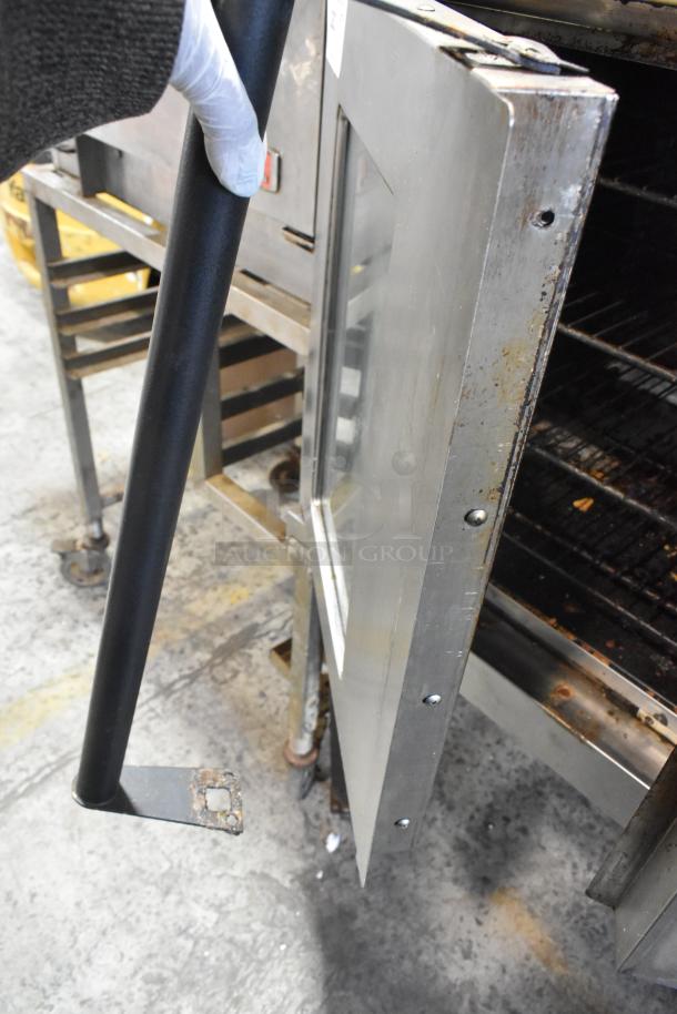 Bakers Pride 456GDCOER21 stainless steel commercial convection oven with view doors, metal racks, and controls, 208V.