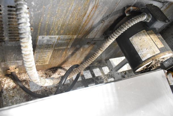 Bakers Pride 456GDCOER21 convection oven interior, showing wiring and labels, needs cleaning. 208 Volts, 1/3 Phase.