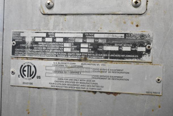 Blodgett 45GEC stainless steel commercial electric oven, 208 volts, 3 phase, with labels indicating compliance and manufacturer details.