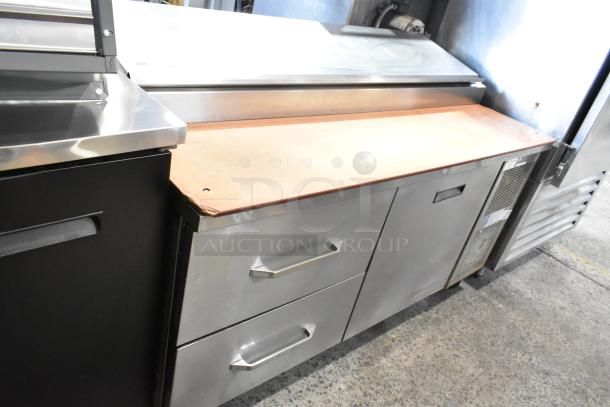 Randell 8268N stainless steel pizza prep table, two drawers, one door, on commercial casters, 115V, 1 Phase, clean condition.