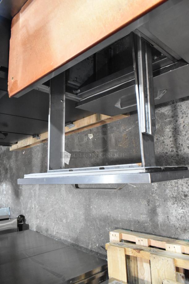 Randell 8268N stainless steel commercial pizza prep table, featuring two drawers and one door, on casters. 115V, 1 phase.