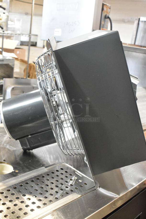 Brand new Canarm S12-E1 12" wall exhaust fan, 1-speed, scratch and dent condition, durable metal construction.