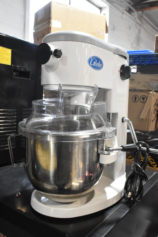 Brand new 2024 Globe SP5 5 Quart Planetary Dough Mixer with metal bowl, bowl guard. 110V, 1 phase, slight scratch and dent.