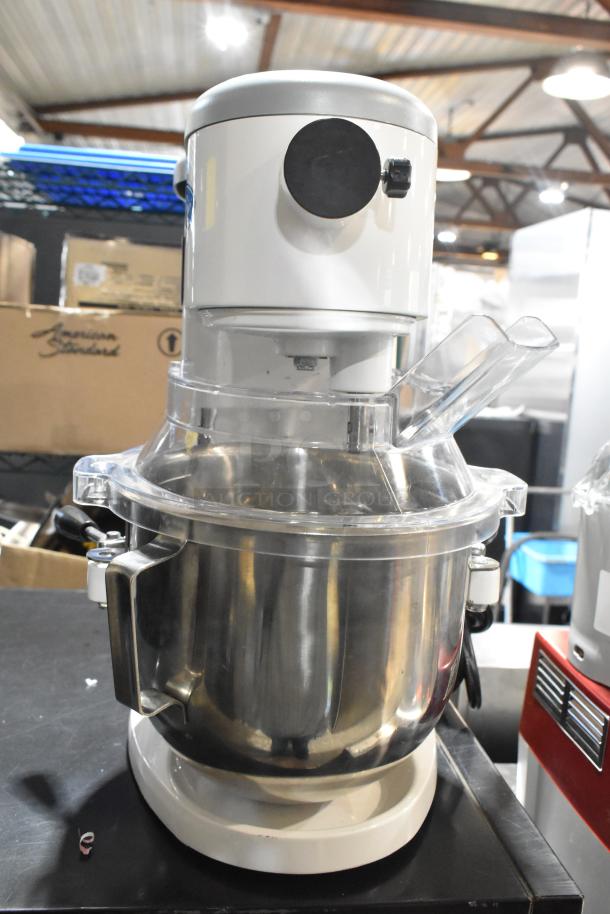 Brand new 2024 Globe SP5 5 Quart Planetary Dough Mixer with metal bowl, bowl guard, 110V, 1 phase, minor scratches.