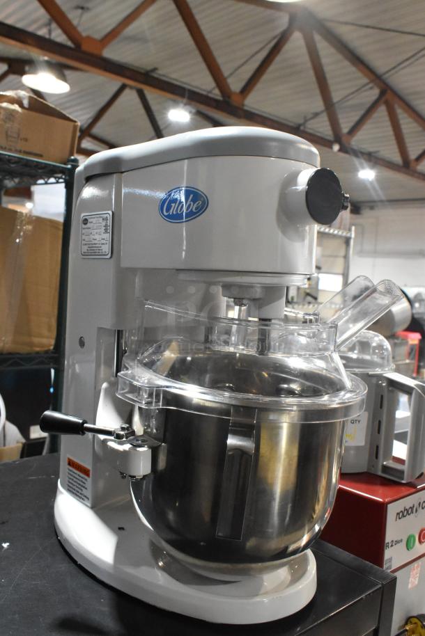BRAND NEW 2024 Globe SP5 5 Qt Planetary Dough Mixer, metal bowl, bowl guard, 110V, 1 phase, minor scratches, tag visible.