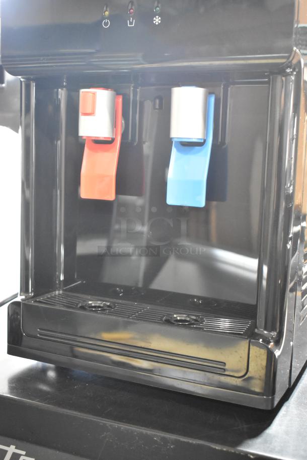 Avalon A1CTWTRCLRBLK countertop water dispenser, dual faucets, 115V, 1 phase, excellent condition, black metal.