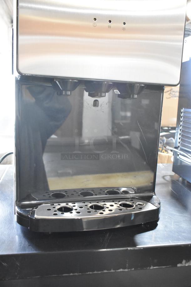 Avalon A11-CTTL metal commercial countertop water dispenser, 115V, sleek design, good condition, power and temperature icons visible.