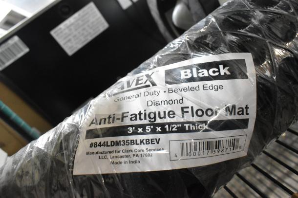 Lavex 844LDM35bLKBEV Black Anti-Fatigue Floor Mat, 3'x5', 1/2" thick, beveled edge, general duty, new condition, packaging label visible.