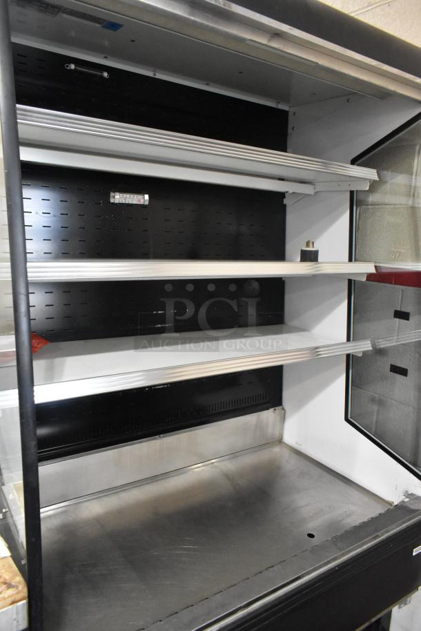 Federal RSSM478SC metal commercial merchandiser with shelves, black interior, 120/208-240 volts, 1 phase, good condition.