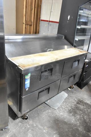 Everest stainless steel sandwich salad prep table, four drawers, commercial casters, 115V, used condition, eco-friendly label.
