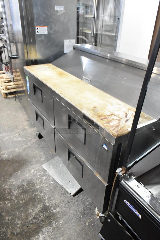 Everest stainless steel commercial sandwich prep table with mega top, 4 drawers, commercial casters, used condition.
