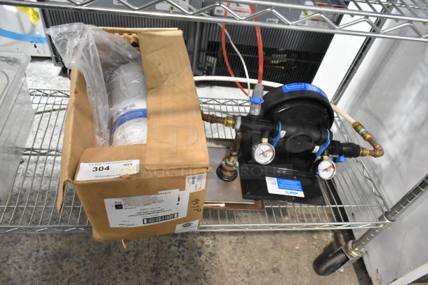 Kay Water Filtration System, includes gauges and tubing, in original packaging. Box label indicates model NAT-10442.