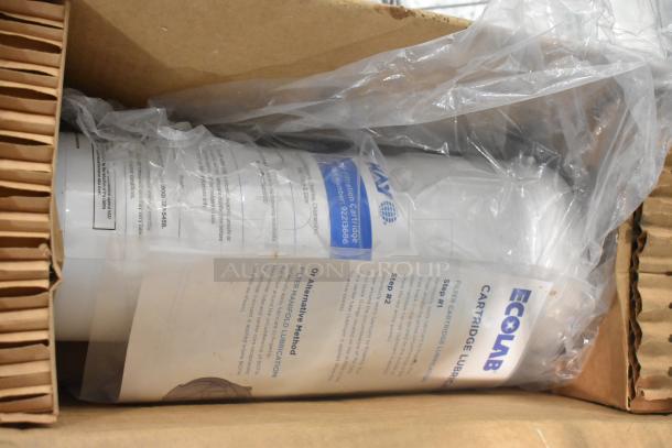 Kay Water Filtration System in box, includes Ecolab cartridge lubricant. New with packaging and visible instructions.