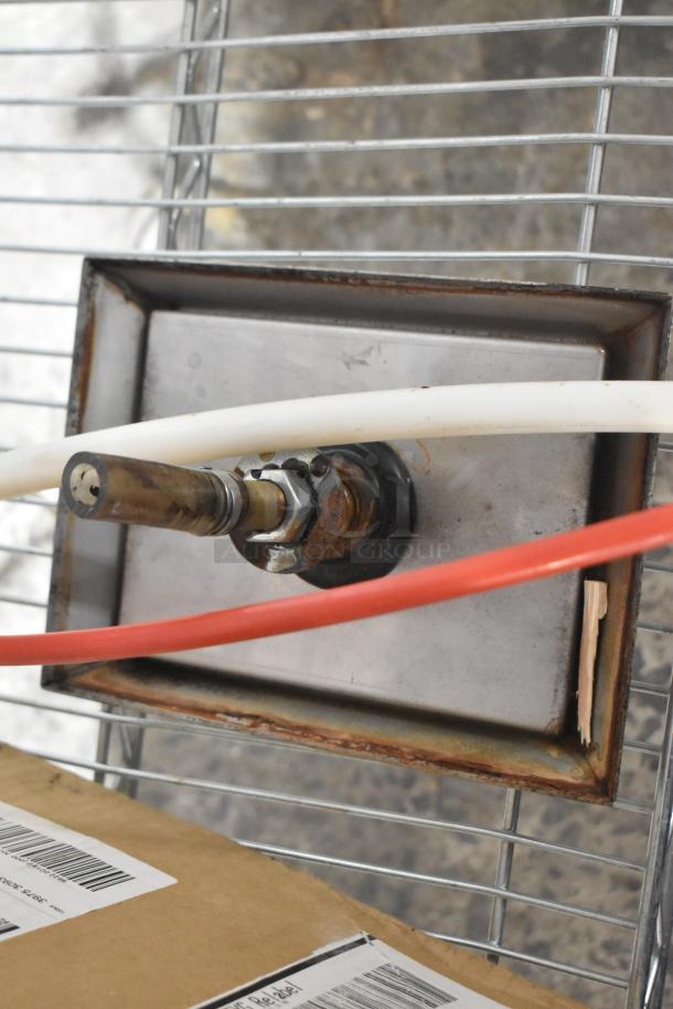 Kay Water Filtration System showing metal panel, connector, and attached hoses in used condition.