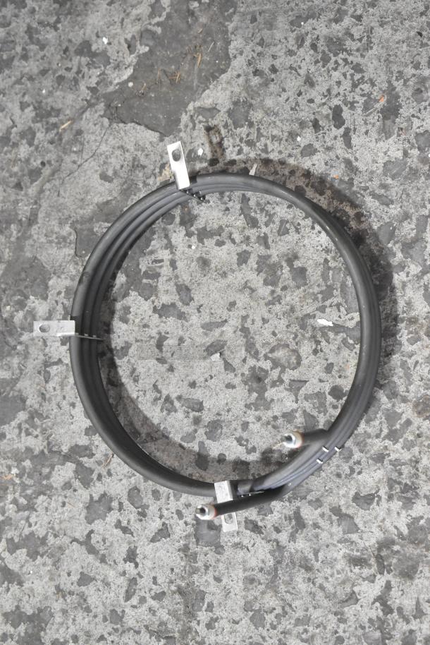 Two metal burners in a circular shape, featuring sturdy connectors and mounting brackets. Suitable for replacement or custom use.