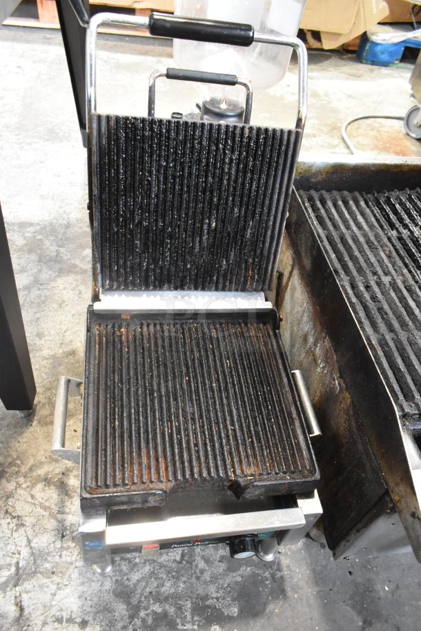 Waring WPG150 stainless steel commercial panini press, grooved plates, fair condition, 120V, 1 Phase.