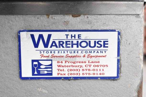 Manitowoc QY1305 stainless steel commercial ice head on bin, 208-230V, 1 phase, excellent condition. Warehouse label visible.