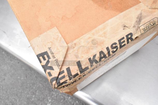 Stainless Steel Equipment Stand with metal under shelf, visible EX-CELL KAISER label on cardboard, new condition.