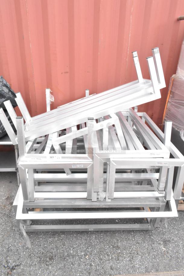 15 metal dunnage racks stacked; durable aluminum construction with visible labels; sold as 15 times your bid.
