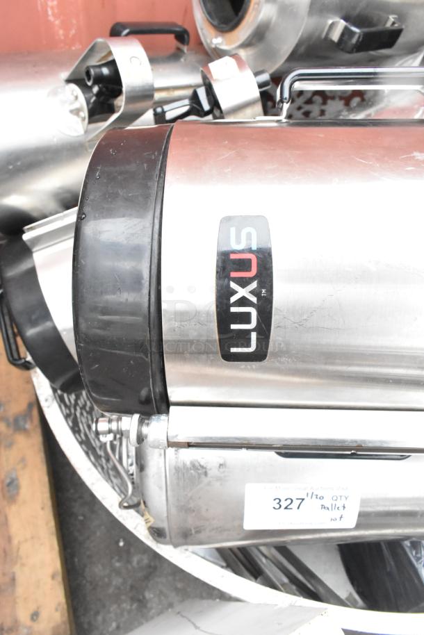 Lot with Fetco TPD-15 Luxus dispensers, stainless steel finish. Visible label shows "327/10 QTY Pallet".