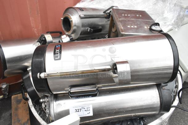 Lot of various items including Fetco TPD-15 Luxus beverage dispensers and a panini press, moderate wear visible.