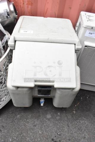 Cambro poly portable ice transport bin on casters, used condition, branded "CAMBRO", features secure latch and drainage spout.