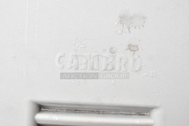 Cambro Poly Portable Ice Transport Bin, featuring embossed brand logo; commercial casters, durable condition.