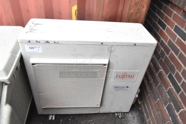 Fujitsu AOU36CLX metal split type air conditioner, 33,100 BTU, visible wear, 208/230V, 1 phase, with Fujitsu Halcyon logo.